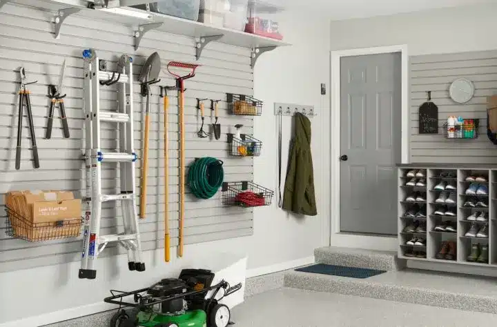 tool wall and shoe storage in the garage space