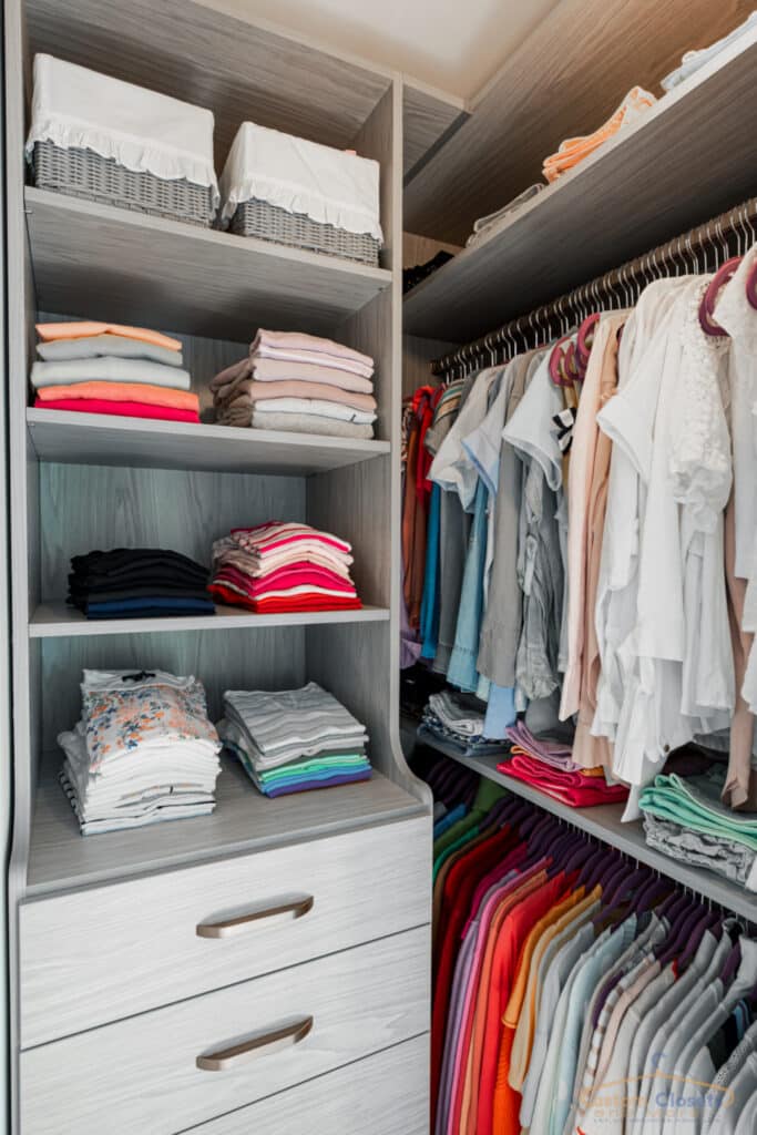 custom closet with folded and hanged clothes