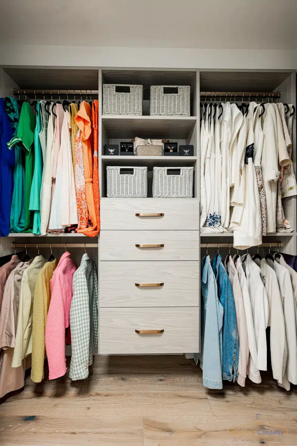 walk in closet with drawers, shelves, and hangers